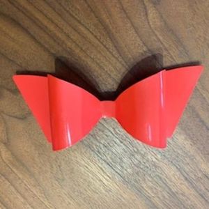 Vintage red plastic hair bow